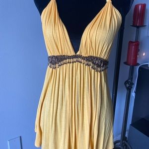 Gorgeous spaghetti strap yellow blouse with incredible detail